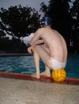 Thinking about having some salmon for lunch while wearing a white Speedo (glute muscles visible)