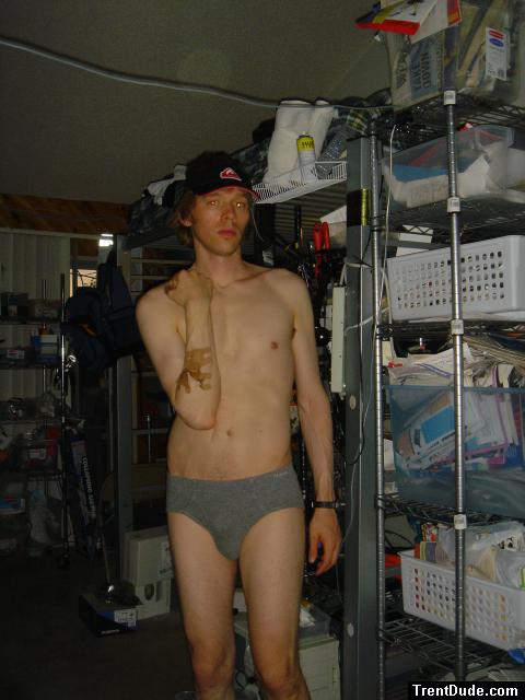 `Trent in grey hanes, quiksilver hat, skateboard bandages