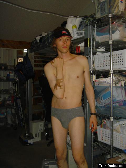 `Trent in grey hanes, quiksilver hat, skateboard bandages