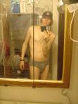 `Trent in grey hanes, quiksilver hat, skateboard bandages