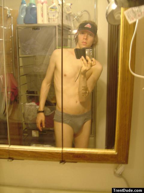 `Trent in grey hanes, quiksilver hat, skateboard bandages