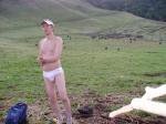 Wearing white  Tommy Hilfiger briefs in a field