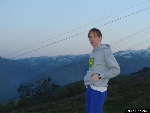 Getting up early to check the cows in blue sweats pants and snowy mountain