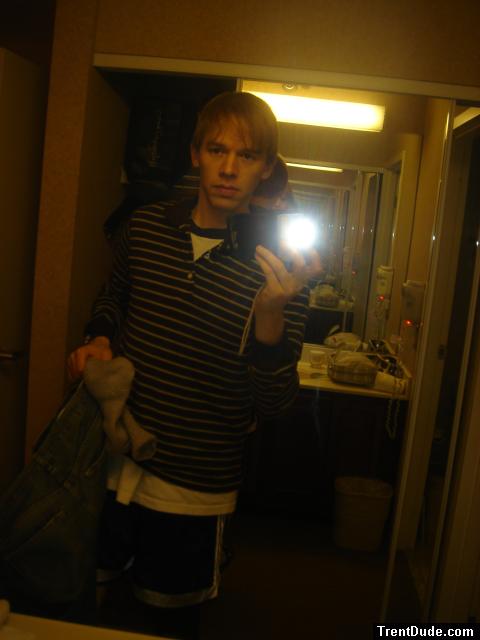 Brown striped shirt! (holding jeans)