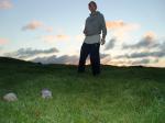 Trent in the grass and colorful sky