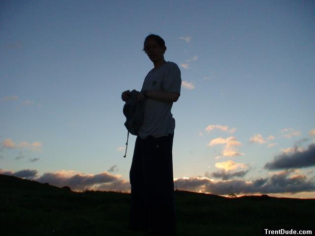 Outside at sunrise in a t-shirt