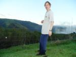 Standing near the fence
