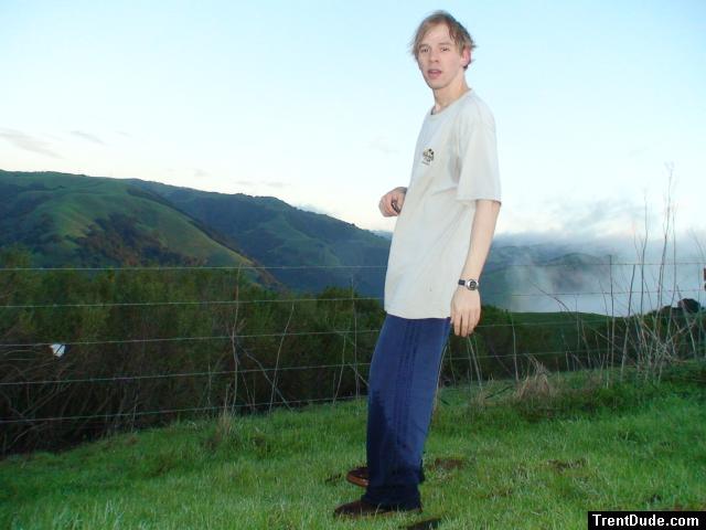 Standing near the fence
