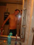 Shirtless in a hotel