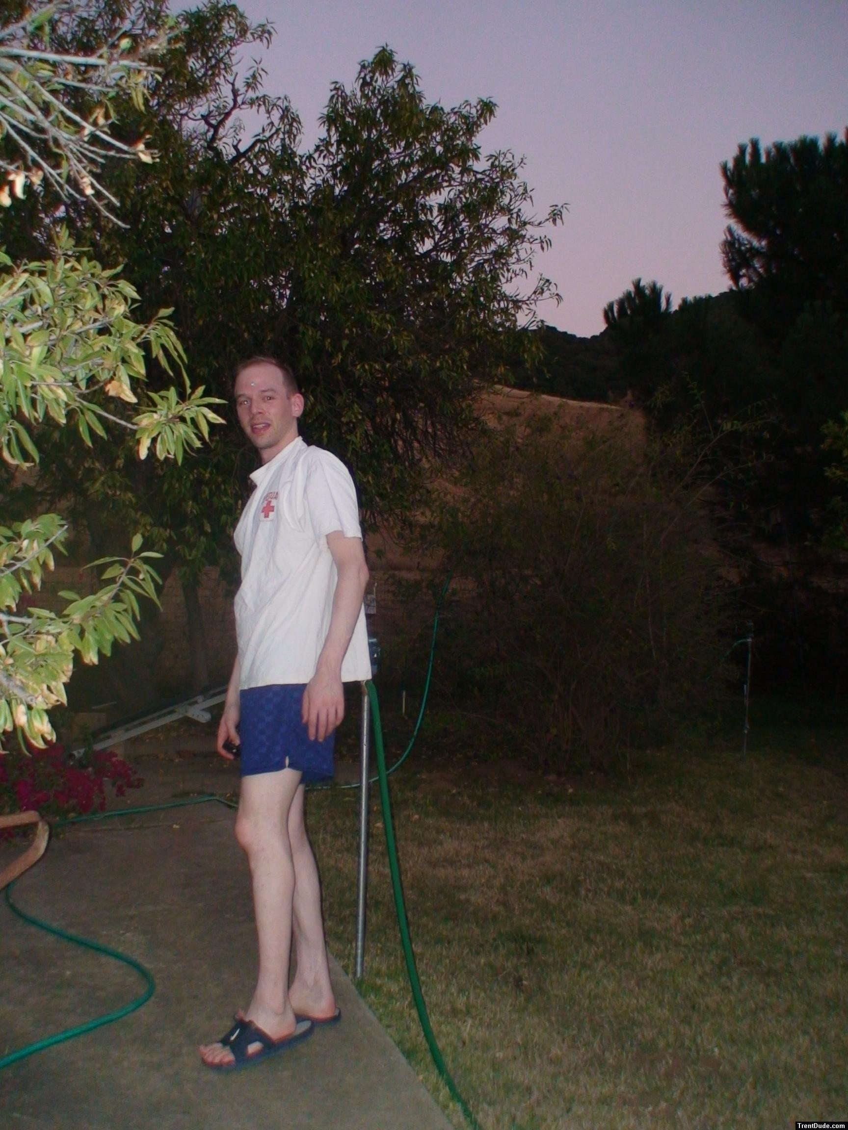 Blue checkered Umbro style soccer nylon shorts, white legs