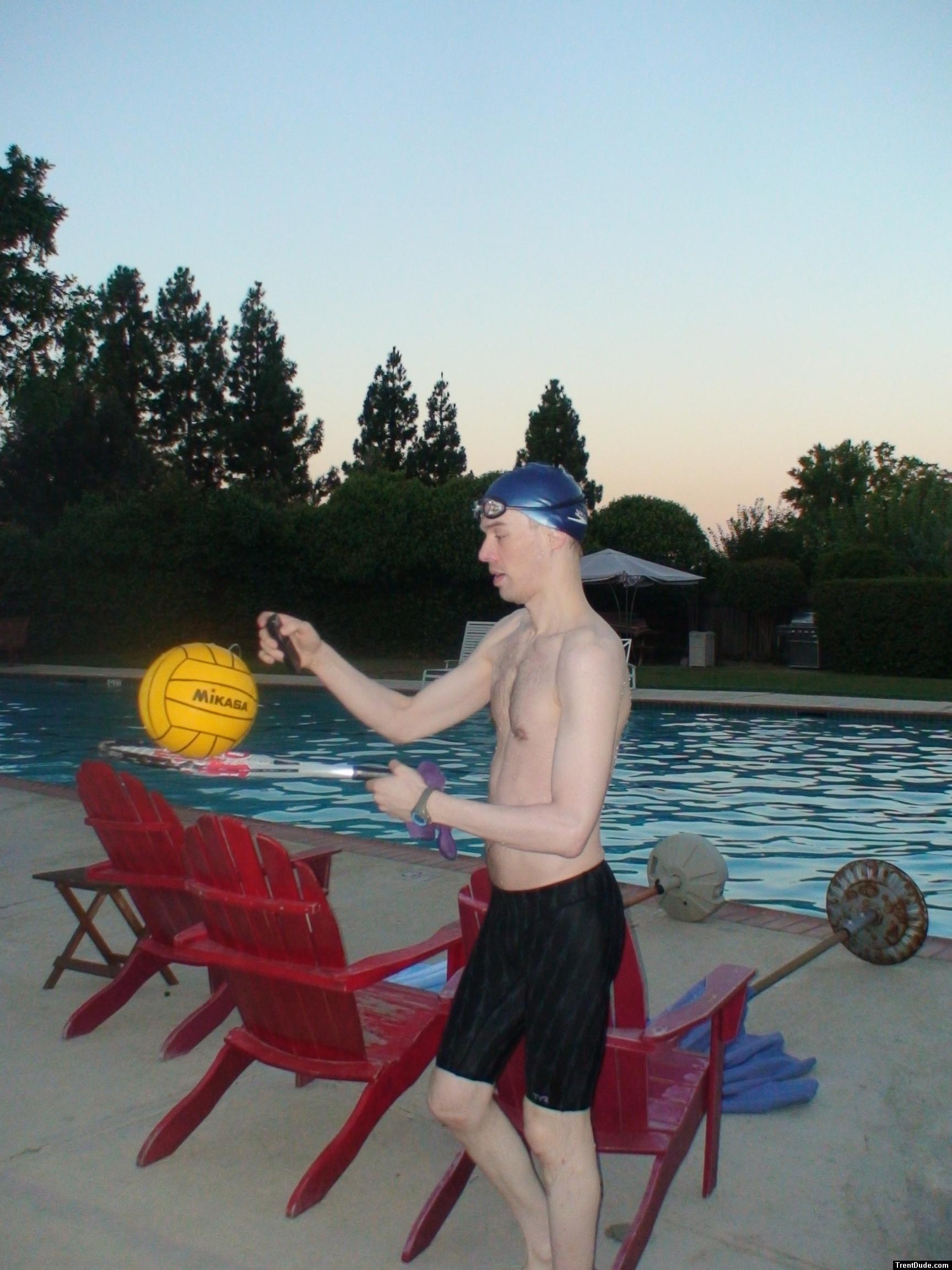 Tossing a water polo ball, wearing Tyr Fusion 2 swim jammer