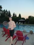 Holding a teniis racked in a Tyr jammer