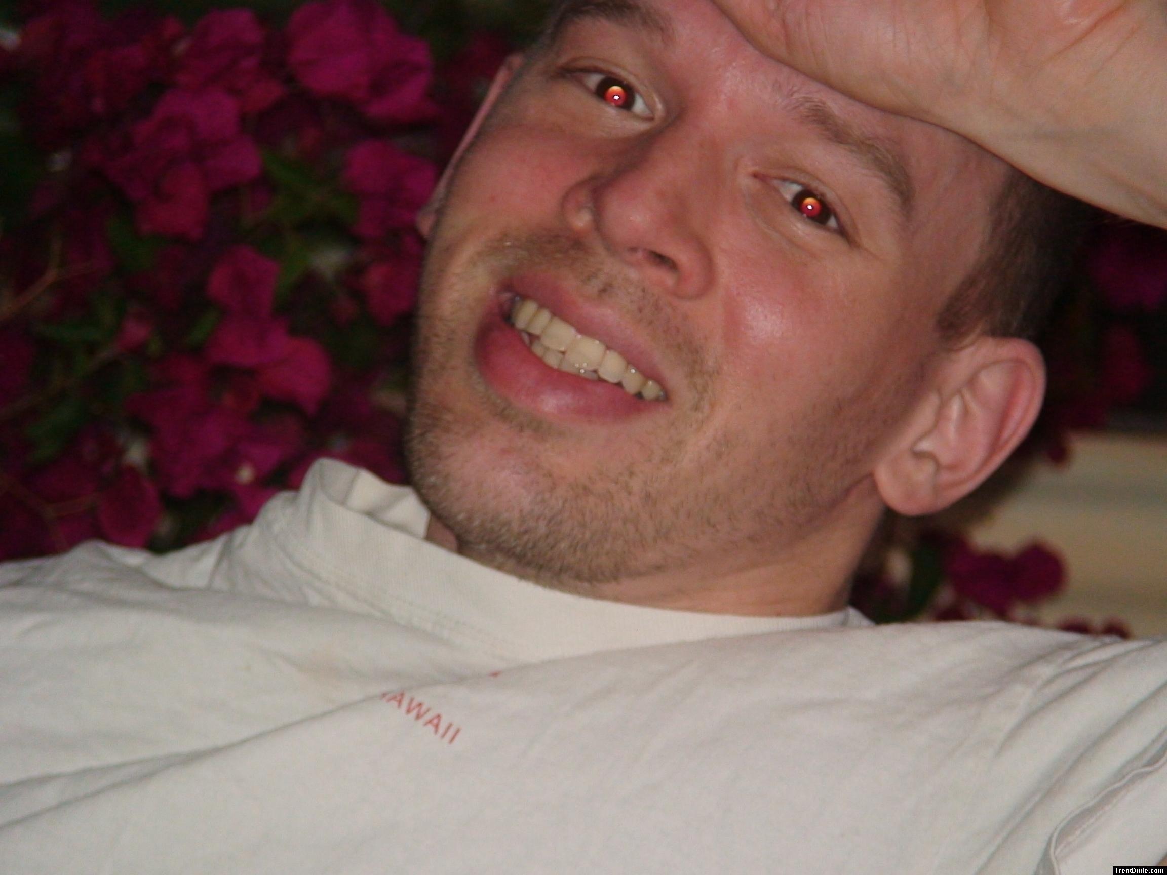 Face and red Bougainvillea flowers, red-eye