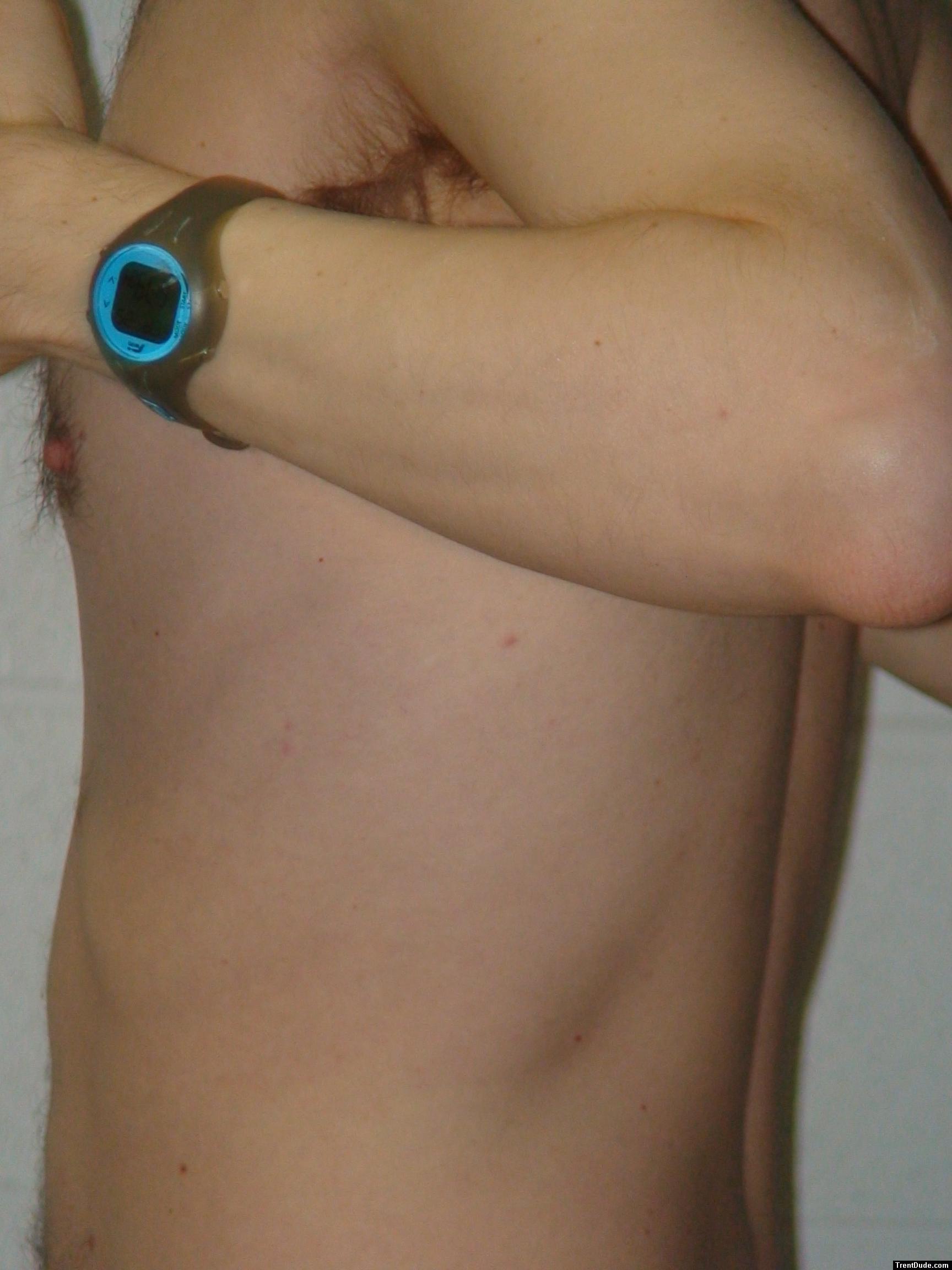 Closeup chest hair and Swimovate pool-mate lap counting watch