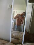 Shirtless in grey sweatpants