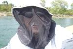 !Trent wearing a skeeto mask on the lake
