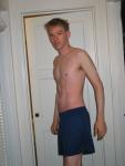 Shirtless in blue Umbro shorts