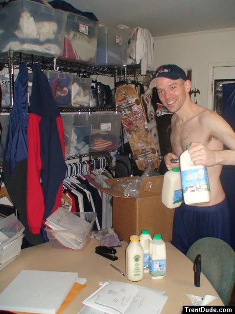 Holding one gallon of raw milk