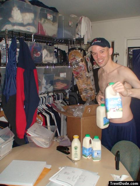 Holding one gallon of raw milk