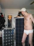 Checking out his new solar panel in Tommy briefs