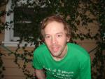 beard and green t-shirt