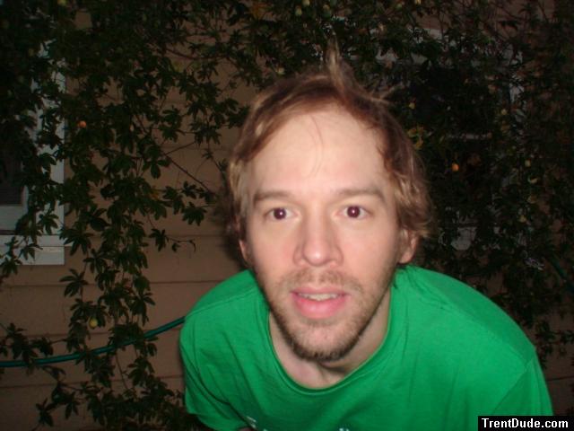 beard and green t-shirt