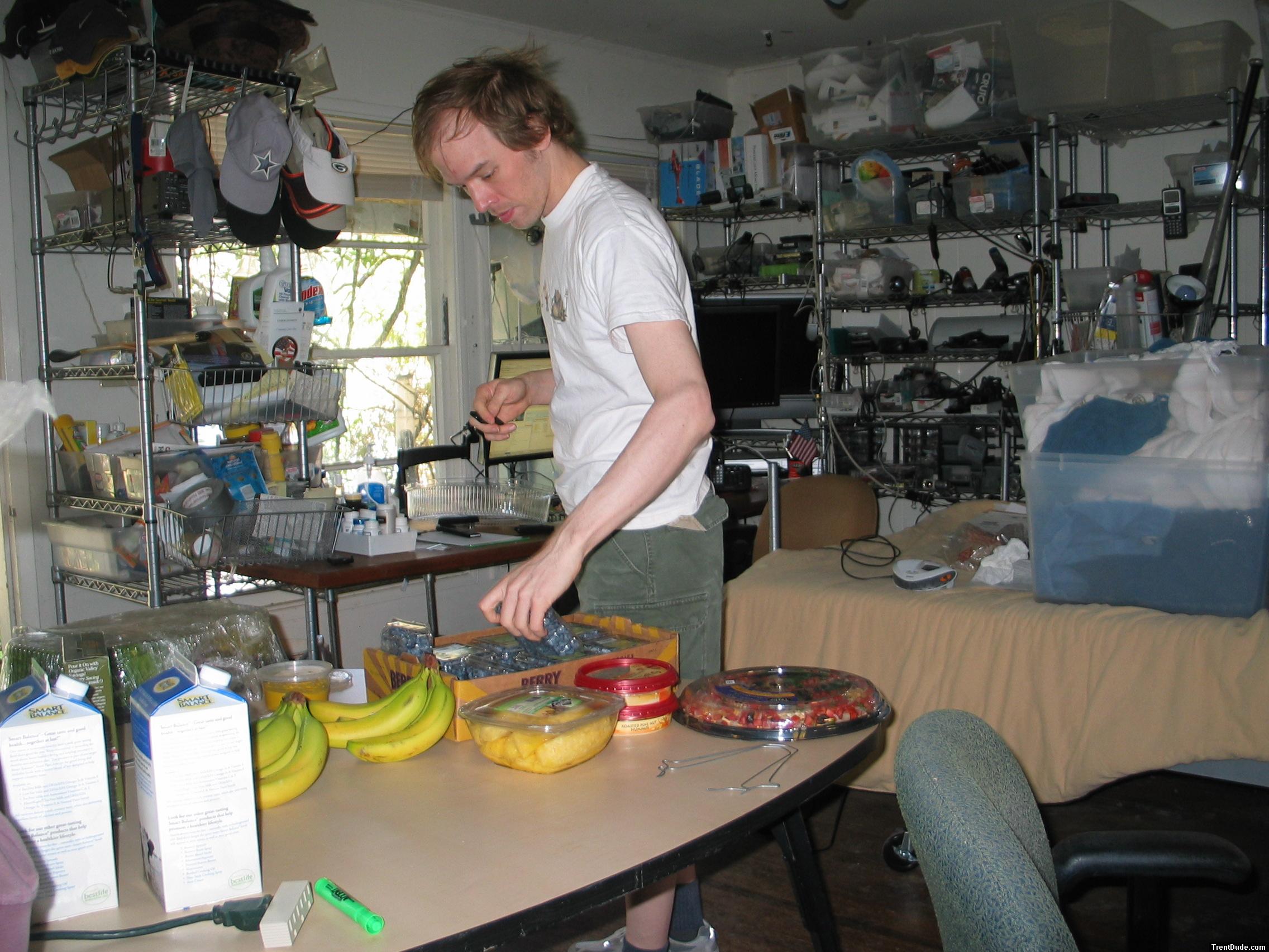 Bananas and berries and a bean dip tray