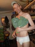 A handful of organic kale next to spinach