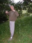 Outdoor sweats photoshoot near a tree (best)
