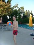 Red speedo jammer, and beach ball
