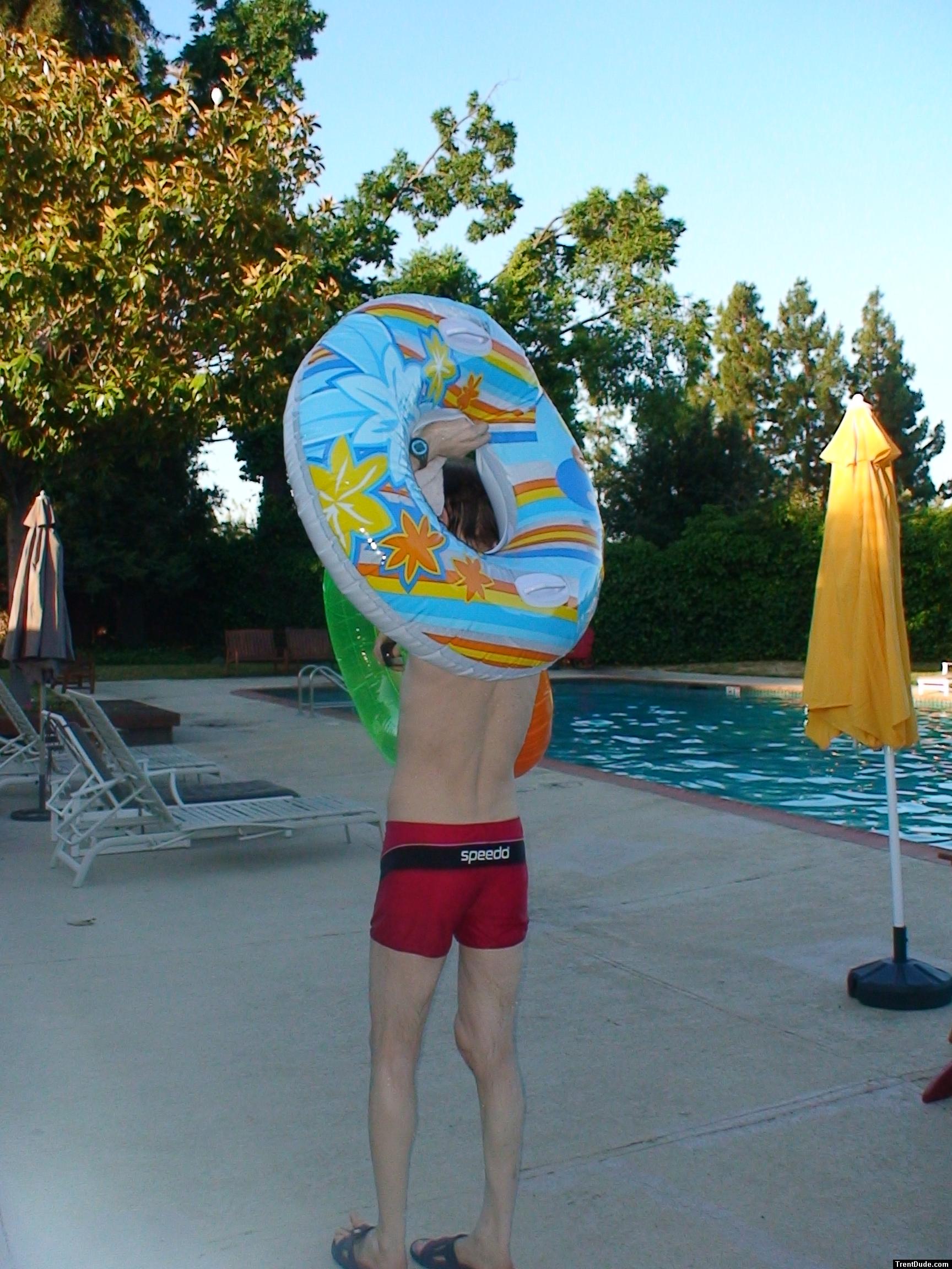 Red speedo jammer, and flotation tubes