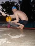 Black Nike Jammer and water polo ball