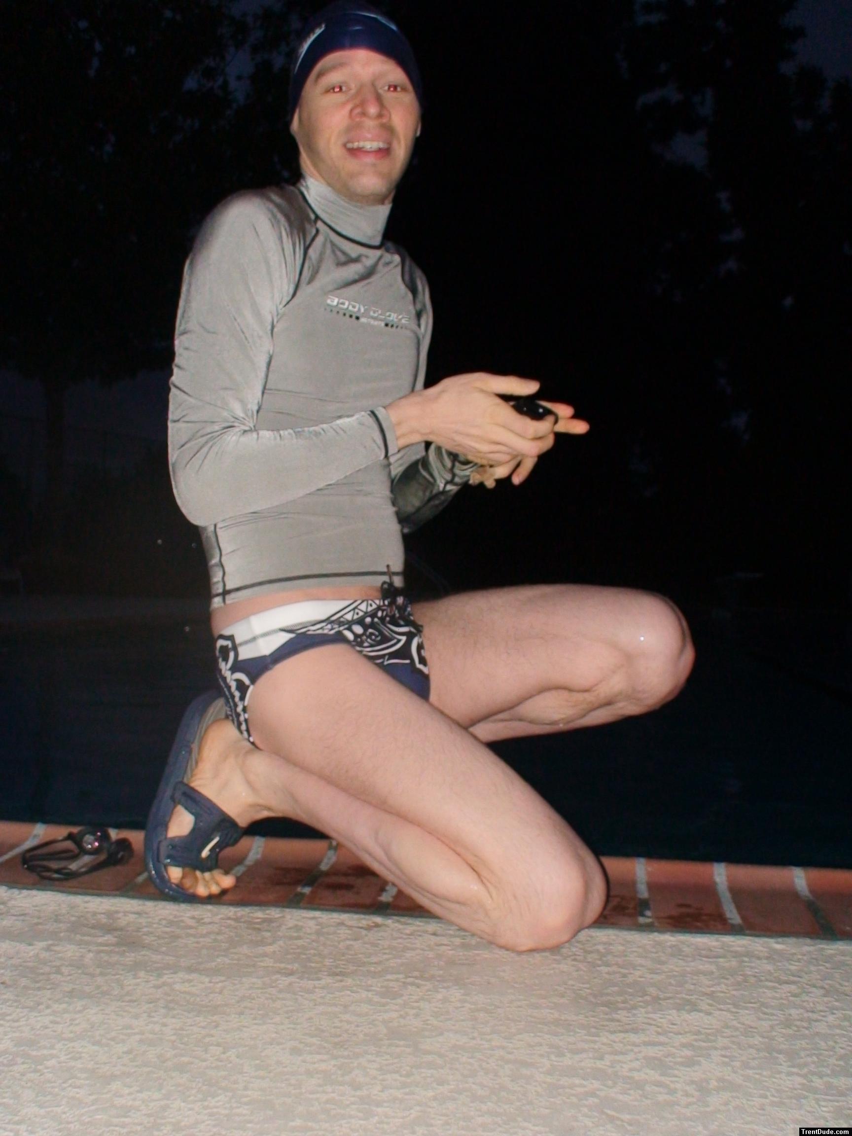 At the pool in an XTG swim suit