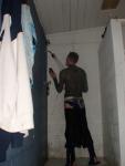 Wet suit and swim brief in the shower (rear) (best)