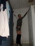 Pulling off wetsuit in the shower