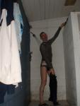 Pulling off wetsuit in the shower