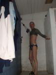 Rinsing rashguard in the shower