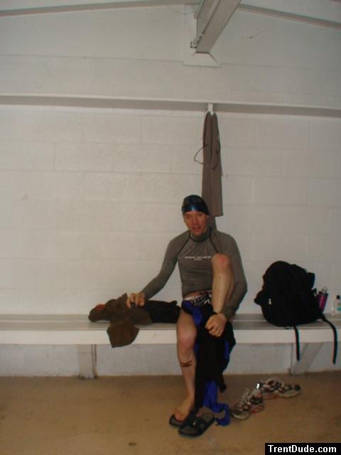 Puttig on a tight wetsuit with a speedo underneath