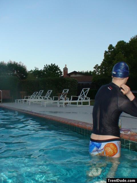 The rashguard says "Protect your Skin" SPF 50