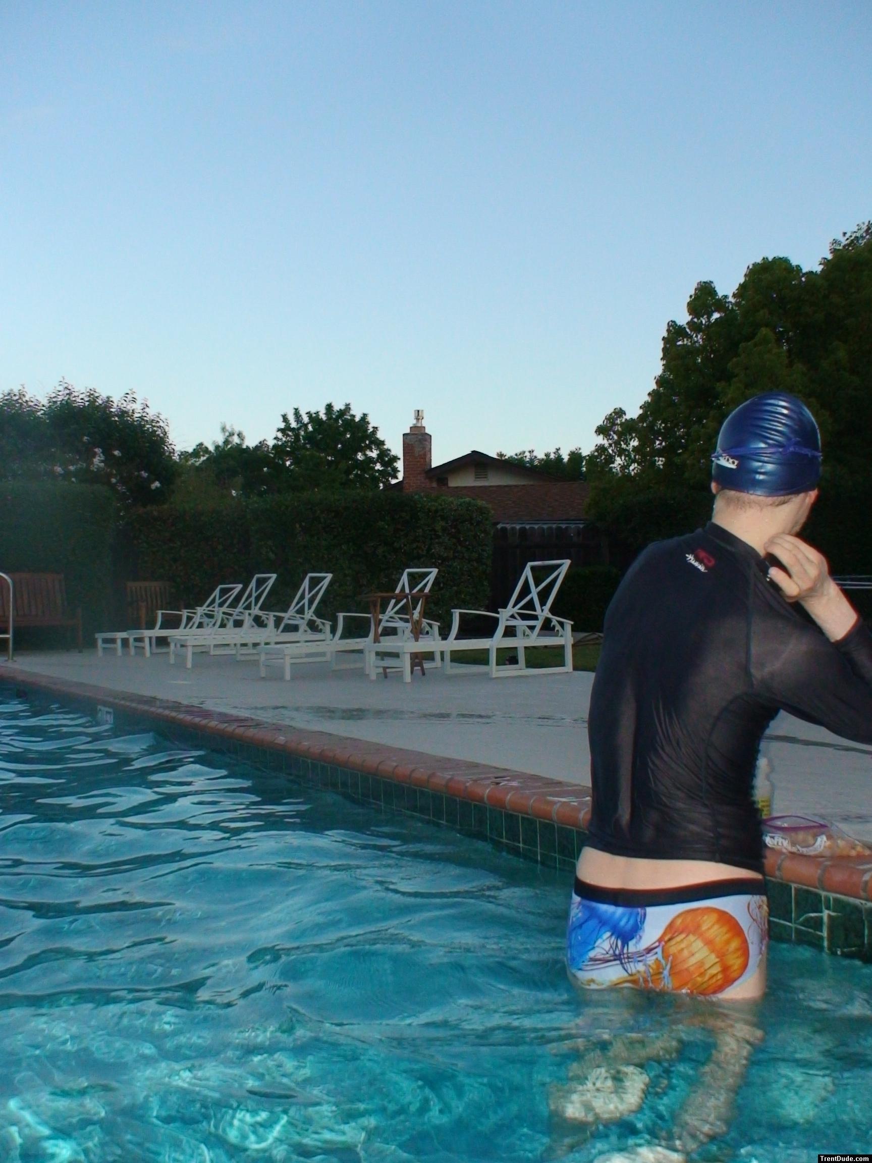 The rashguard says "Protect your Skin" SPF 50