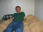 relaxing in  Quiksilver Jeans, green shirt