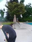 Bending over in a wetsuit