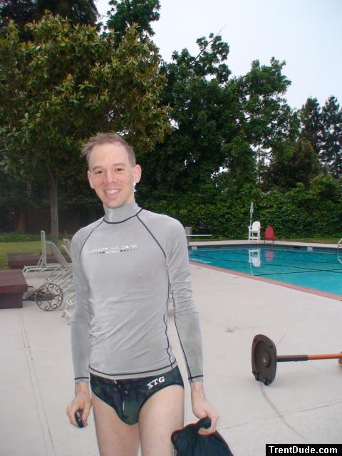 Dude in body glove rash guard, camouflage speedo