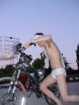 Pushing a bike in speedo