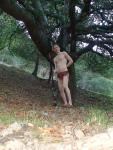Next to the fertility tree with a spear