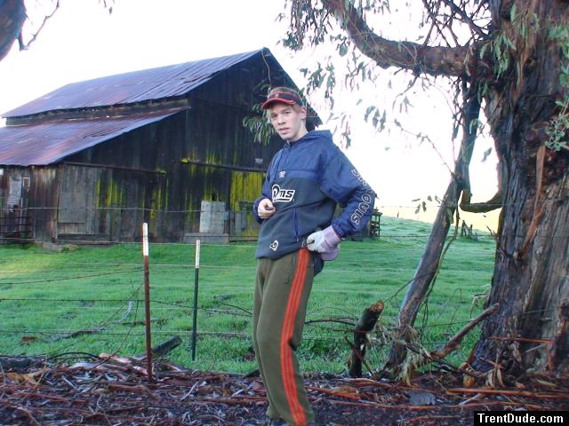 Farm person in front of barn!