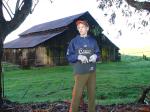 =Trent standing in front of the barn (Rams football jersey, Addidas sweat pants) !