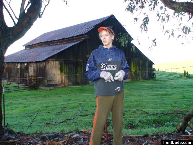 =Trent standing in front of the barn (Rams football jersey, Addidas sweat pants) !