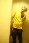 yellow t-shirt, punk hair (in a dressing room)