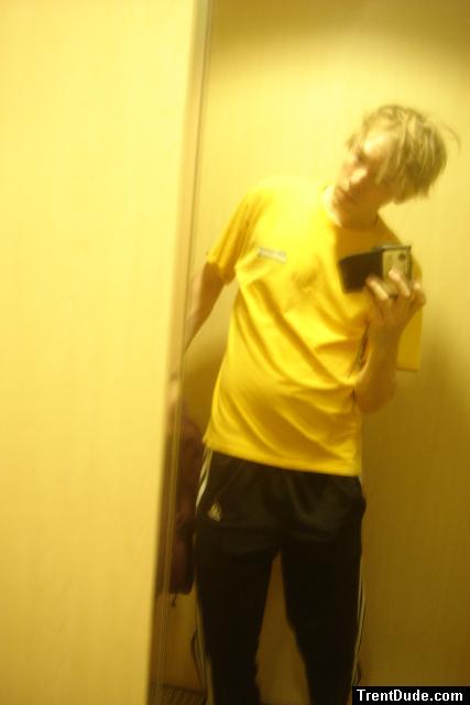yellow t-shirt, punk hair (in a dressing room)